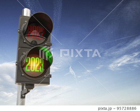 Traffic light with green light 2023 and red 2022 on sky background. Start New 2023 Year concept. 95728886