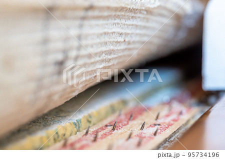 Carpet tack strip exposed during a flooring home improvement project Carpet tack strip exposed during a flooring home improvement project 95734196