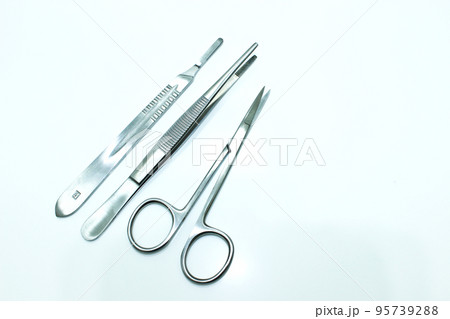 Surgical Instruments Isolated on the White Background Surgical Instruments Isolated on the White Background 95739288