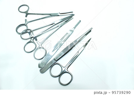 Surgical Instruments Isolated on the White Background Surgical Instruments Isolated on the White Background 95739290