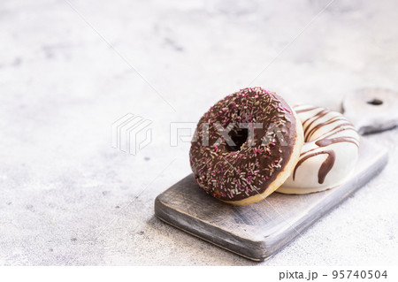 Assortment of various colorful donuts. 95740504