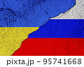 Russia and Ukraine war conflict. Ukrainian and Russian flag on a cracked stone wall. War, crisis, aggression concept. 95741668
