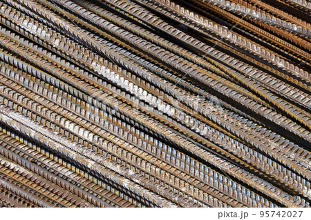 Steel iron industry material. Steel bars for building and foundation construction background. Steel iron industry material. Steel bars for building and foundation construction background. 95742027