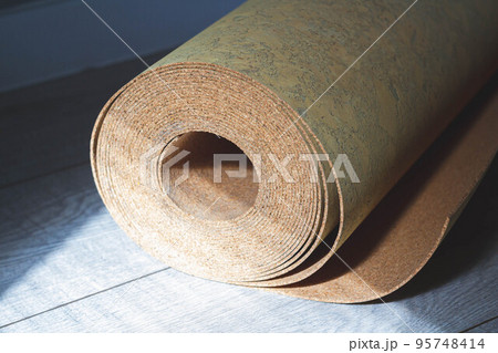 Cork substrate. Natural substrate for laying laminate flooring. Quality product. Renovation in house. Cork substrate. Natural substrate for laying laminate flooring. Quality product. Renovation in house. 95748414