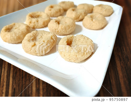 North Indian sweets known as peda or pera made from milk and sugar North Indian sweets known as peda or pera made from milk and sugar 95750897