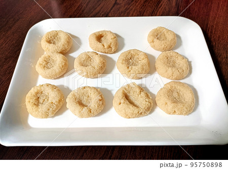 North Indian sweets known as peda or pera made from milk and sugar North Indian sweets known as peda or pera made from milk and sugar 95750898