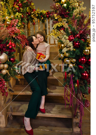 Family Christmas in living room Family Christmas in living room 95752597