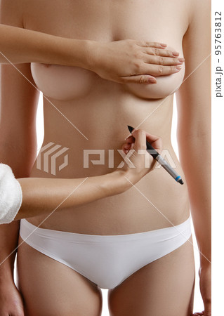 Woman touch, hand inside panties and masturbating. Focus on hand Stock  Photo