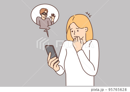 Scared woman frustrated with internet scam on cell Scared woman frustrated with internet scam on cell 95765628