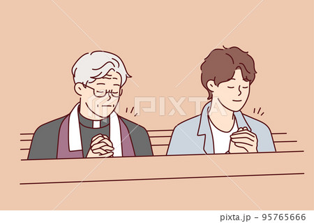 Man and priest pray in church  95765666
