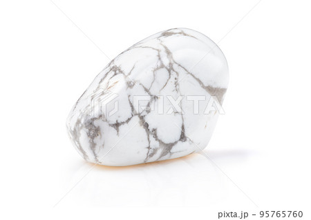 Magnesite or Howlite Mineral Gem Stone on White 95765760