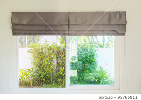 Roman blind curtain decoration in living room interior 95766911