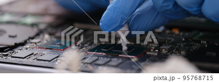 Cpu microchip processor with thermal paste closeup Cpu microchip processor with thermal paste closeup 95768715