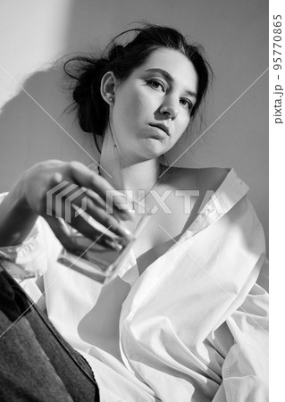 young woman with alcohol 95770865