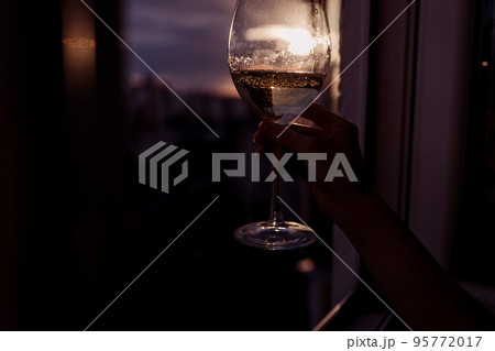 woman with a glass of wine woman with a glass of wine 95772017