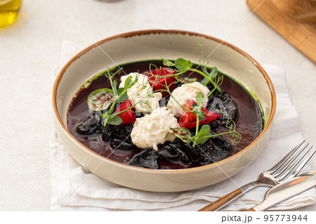 Dried beet salad with stracciatella cheese Dried beet salad with stracciatella cheese 95773944