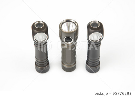 different lanterns flashlight on a white background. item for camping and household life. 95776293