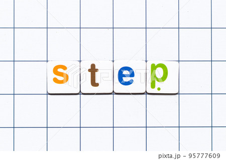 Colorful tile letter in word step on white grid background 95777609