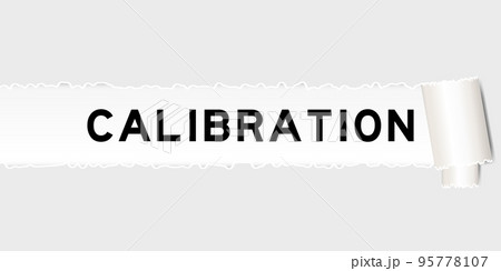Ripped gray paper background that have word calibration under torn part 95778107