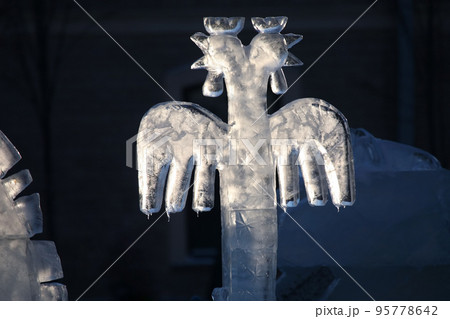 ice figure of a bird in the sun. 95778642