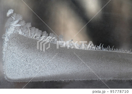 unusual frost on a winter window 95778710