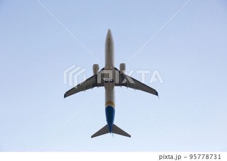 passenger jet plane flying in the sky. passenger jet plane flying in the sky. 95778731