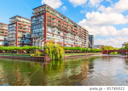 Modern blocks on the Spree, beautiful river view of Berlin, Germany 95780022