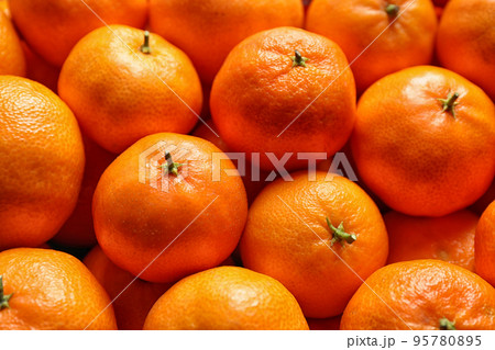 Delicious fresh ripe tangerines as background, closeup Delicious fresh ripe tangerines as background, closeup 95780895
