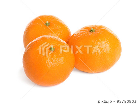 Fresh ripe juicy tangerines isolated on white Fresh ripe juicy tangerines isolated on white 95780903
