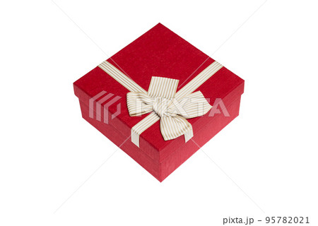 Red gift box with gold ribbon and bow isolated on white background 95782021