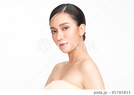 Beautiful young asian woman with clean fresh skin on white background, Face care, Facial treatment, Cosmetology, beauty and spa, Asian women portrait. Beautiful young asian woman with clean fresh skin on white background, Face care, Facial treatment, Cosmetology, beauty and spa, Asian women portrait. 95785853