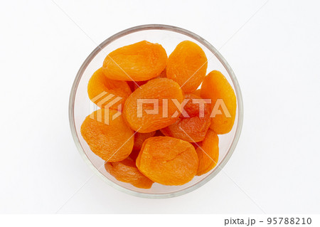 Dried apricots on white background. 95788210