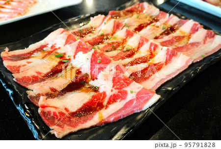 Raw food fresh meat on black tray Raw food fresh meat on black tray 95791828