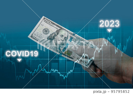 inflation in 2022 and 2023, dollar hyperinflation with dark blue background. one hundred dollars bill in hand of man on against rising inflation chart. US dollar inflation inflation in 2022 and 2023, dollar hyperinflation with dark blue background. one hundred dollars bill in hand of man on against rising inflation chart. US dollar inflation 95795852