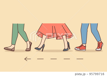 People legs walking in one direction People legs walking in one direction 95799716