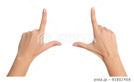 Woman making frame with hands on white background, closeup 95802408