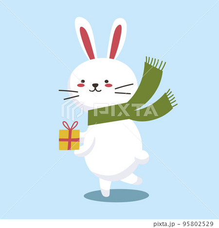 Cute Christmas bunny. Flat cartoon illustration of a little white rabbit holding a gift on a blue background. Vector 10 EPS. 95802529
