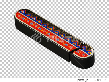 A closeup of a pencil case with artistic painting on a white background. Central Asia, Uzbekistan 95804193