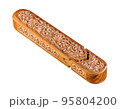 The artistic wood carving on the pencil case on a white background. Central Asia, Uzbekistan 95804200