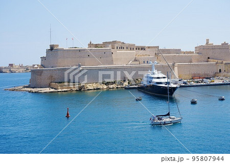 Luxury yachts and fort St Angelo in Birgu city in Malta 95807944