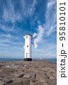 Old windmill lighthouse in Swinoujscie, a port in Poland on the Baltic Sea. 95810101