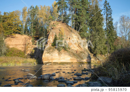Zvartes cliff on river Amata, Latvia with sky. 95815970