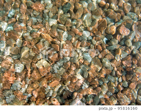Coast. Pebble stones by the sea. Abstract background. Underwater Coast. Pebble stones by the sea. Abstract background. Underwater 95816160