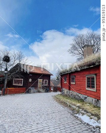View of a farmhouse in the skansen museum in Stockholm. View of a farmhouse in the skansen museum in Stockholm. 95819313