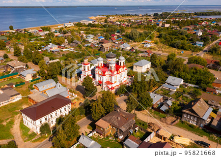 Aerial view of Russian town of Kozmodemyansk on Volga river with Smolensky Cathedral Aerial view of Russian town of Kozmodemyansk on Volga river with Smolensky Cathedral 95821668