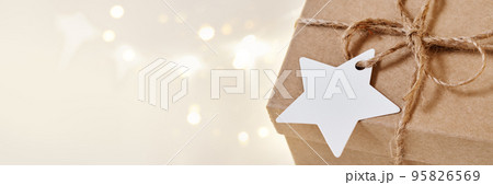 Banner with Christmas sustainable gift box with blank card. Christmas zero waste, boxing day and winter holiday 95826569