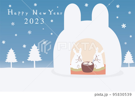 かまくらの中でお餅を食べる兎の年賀状のイラスト素材