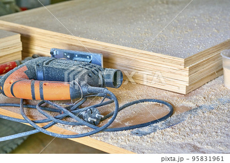 Heating industrial dryer gun tool, wood plywood sheets and sawdust Heating industrial dryer gun tool, wood plywood sheets and sawdust 95831961