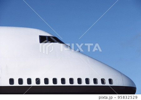 Cockpit close up of white jet airplane 95832529