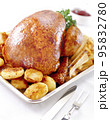 Whole roasted chicken with potatoes 95832780